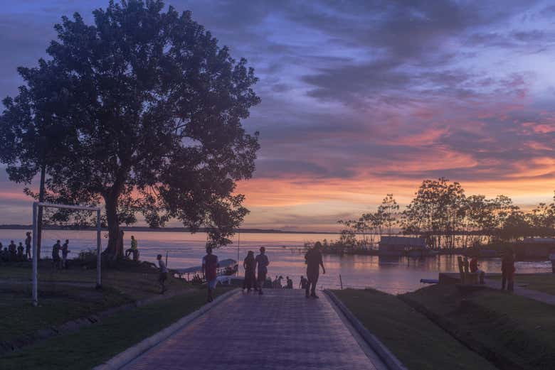 Watch the sunset over the river