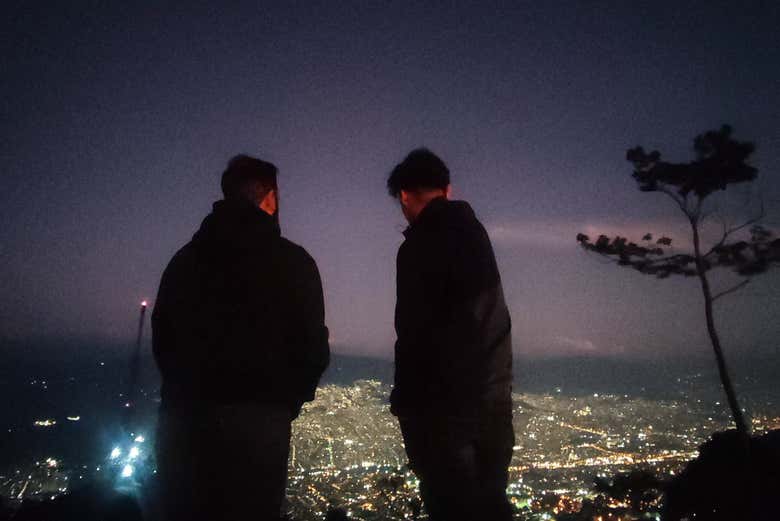 Stroll through the city as it lights up at night