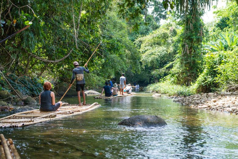 Enjoying the peaceful bamboo raft ride!