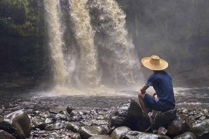 Admiring the Tres Chorros Falls