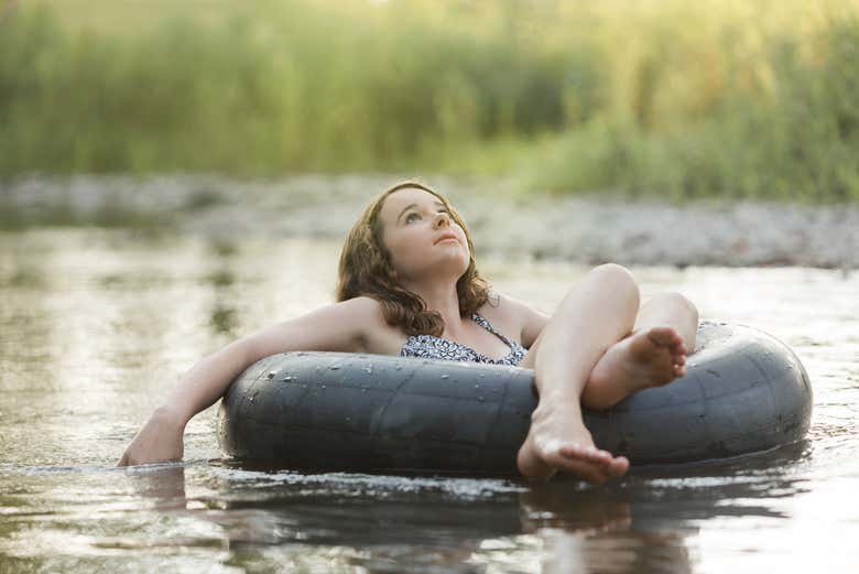 En flotador de tubing por el río Güape