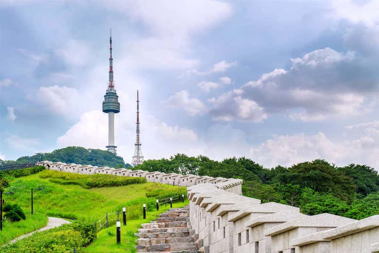 Go up the steps that lead to Seoul Tower