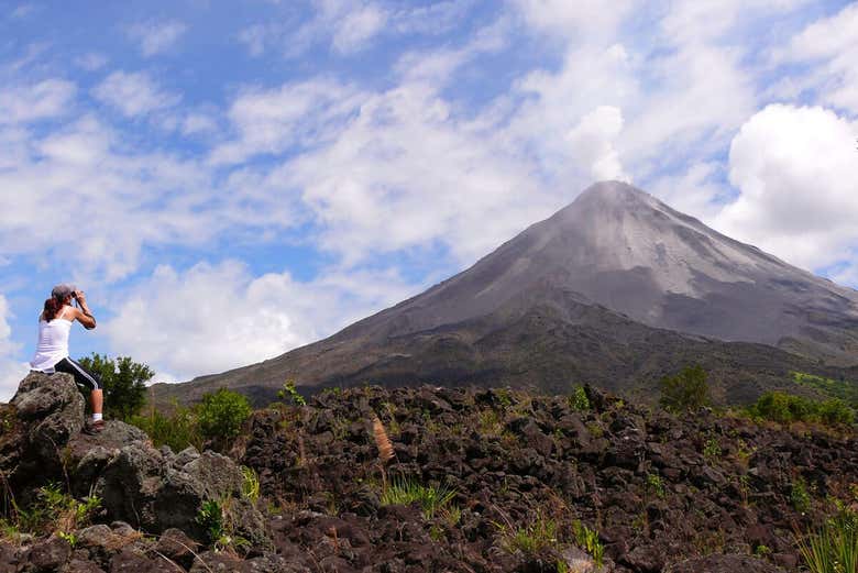 Admire the volcano with binoculars