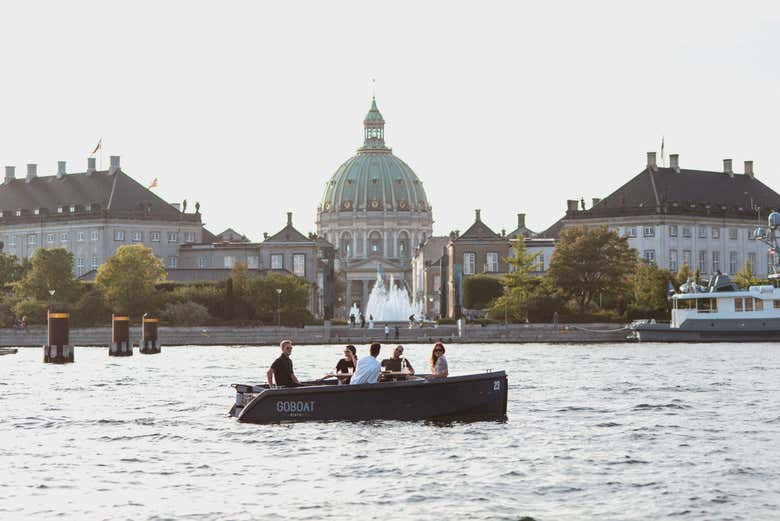 Palace in background with GoBoat in front