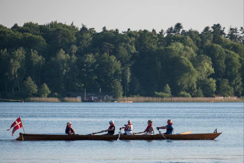 A group rowing on the lake