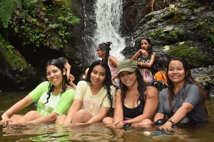 Taking a dip at the waterfalls of El Naranjal