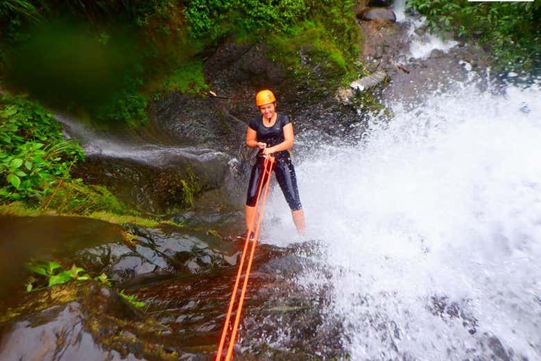 Canyoning down a waterfall