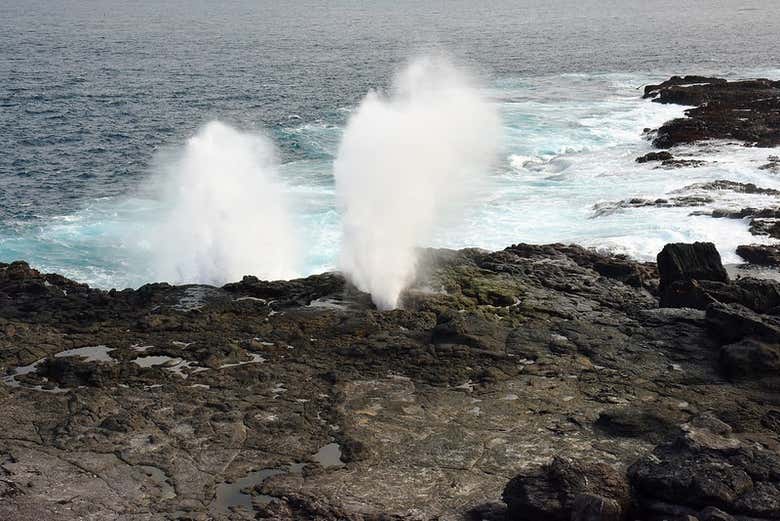 Waves crashing at Española Island