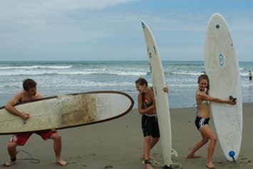 Having fun during the surfing lesson in Montañita