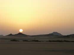 Setting sun over Egypt's desert