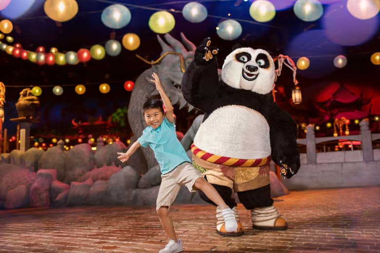A kid having fun with Kung Fu Panda
