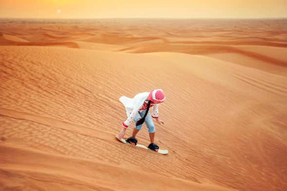 Sandboarding in the Dubai Desert