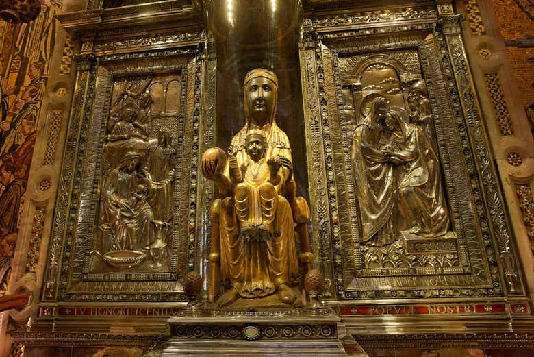 See the Moreneta, patron saint of Catalonia