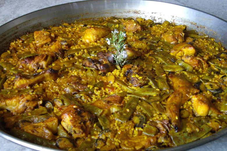 Enjoy a delicious paella on board