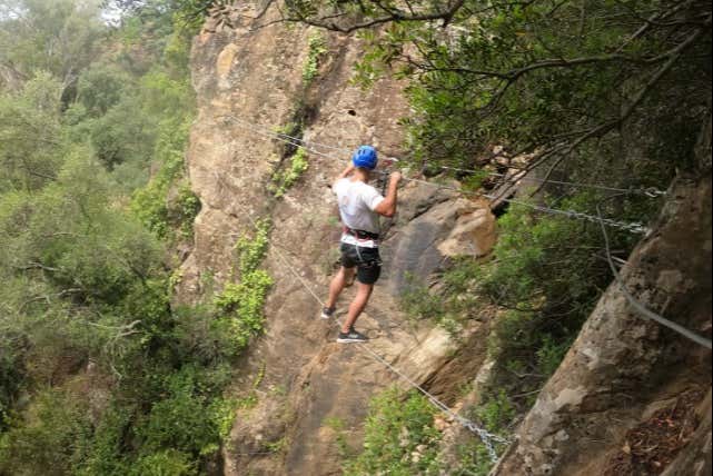 A boy bravely tackling the via ferrata route