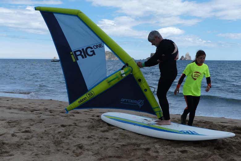Practicing windsurfing
