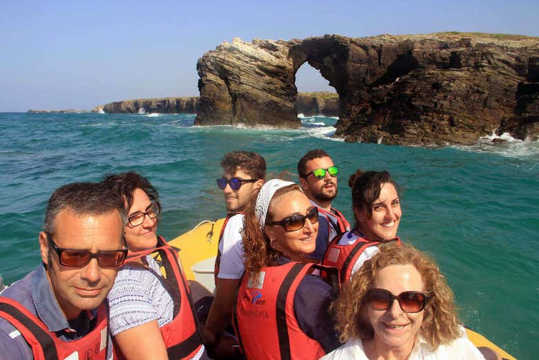 A group enjoying the boat trip along the coast of Foz