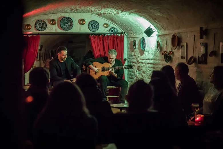 A singer and guitarist on stage