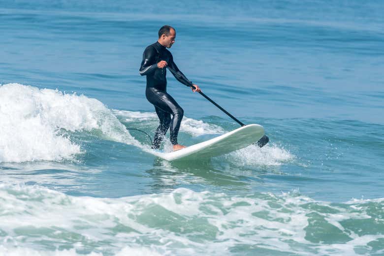 Enjoying the paddle surfing