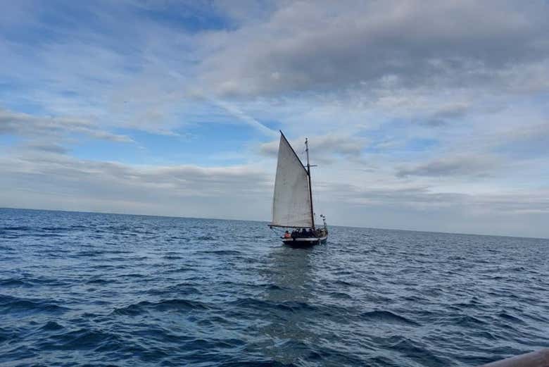 A sail boat sailing in the waters of La Coruña