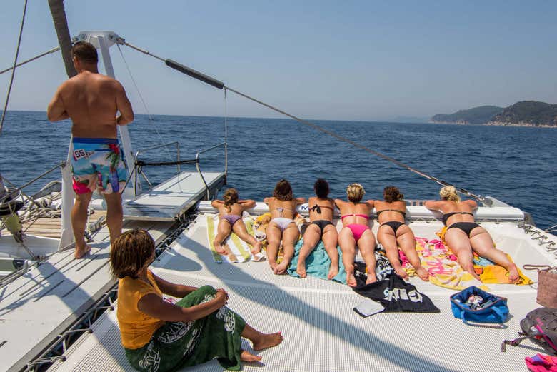 Sunbathing on the catamaran