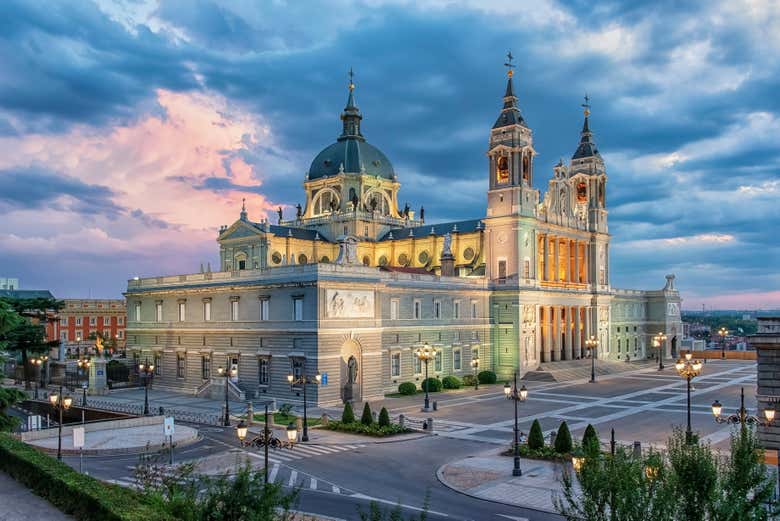 Admire the illuminated majesty of the Almudena Cathedral