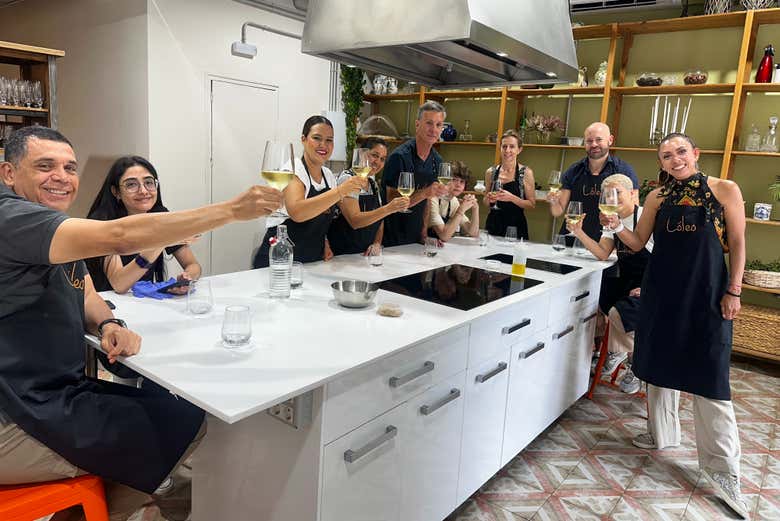 Toasting to success after finishing our Spanish cooking class in