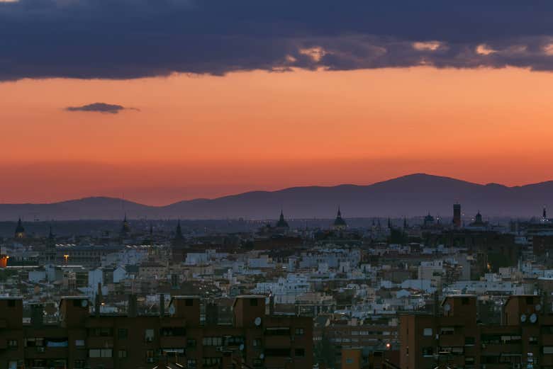 Watch the city transform as the sun sets over Madrid