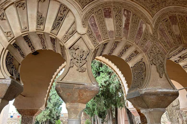 See the architectural details of the Alcazaba