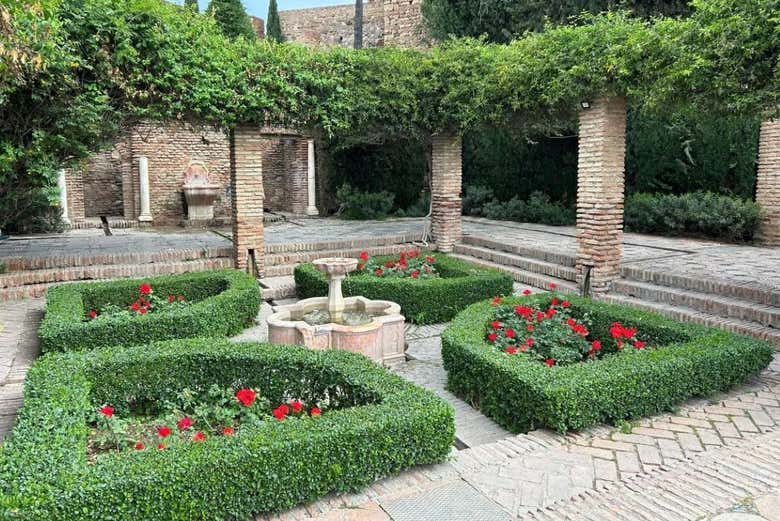 Explore the Patio de Armas and its Hispano-Andalusian gardens