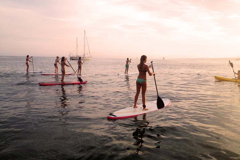 Paddling alongside a boat