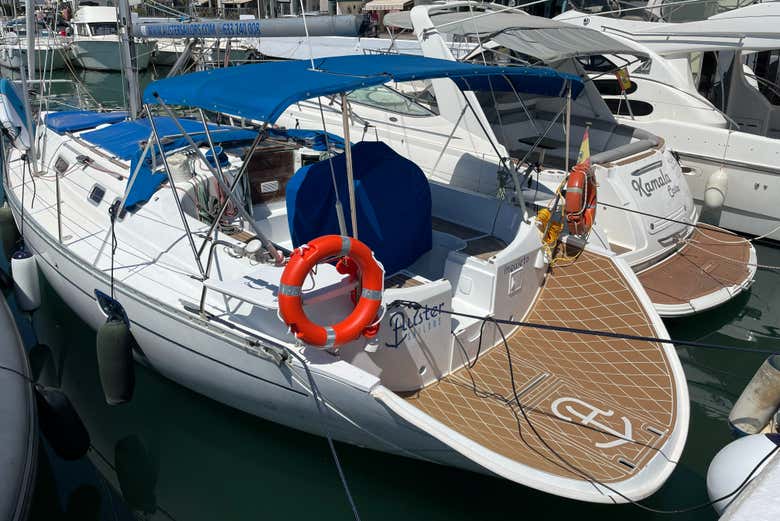A view of the sailboat from the stern