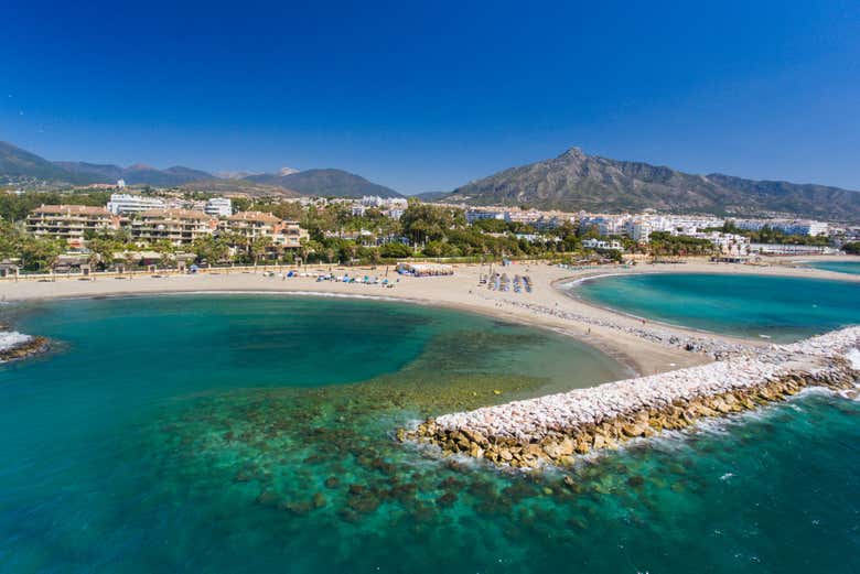 Sailing between golden sandy beaches