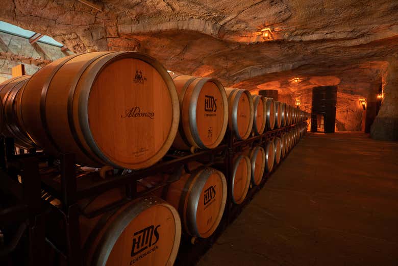Visit the barrel room in this authentic winery