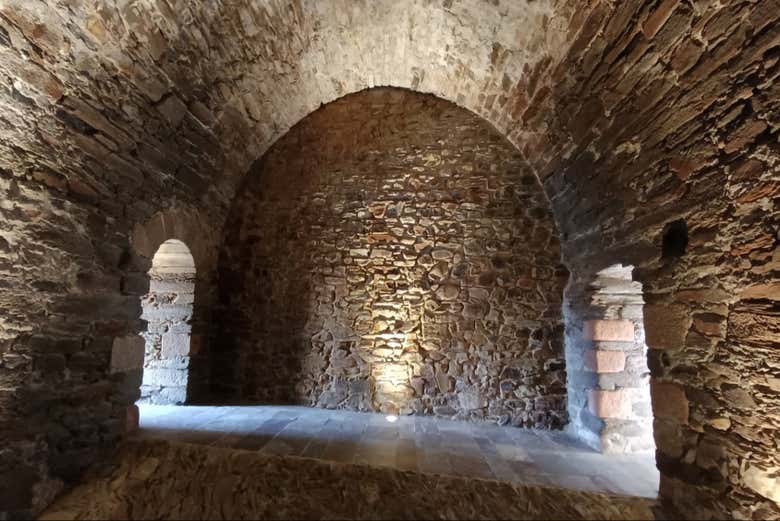 Step inside the castle's vaulted stone chambers