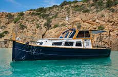 Paseo en barco privado por Cala Bassa e isla Conejera