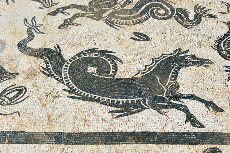 See incredible mosaics at the House of Neptune