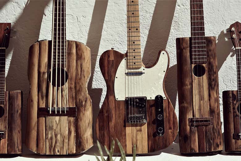 Admire guitars and ukuleles made from agave wood