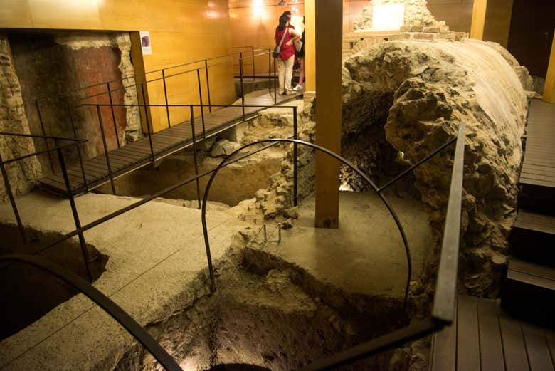 Walk across the metal catwalks of the Roman archaeological site