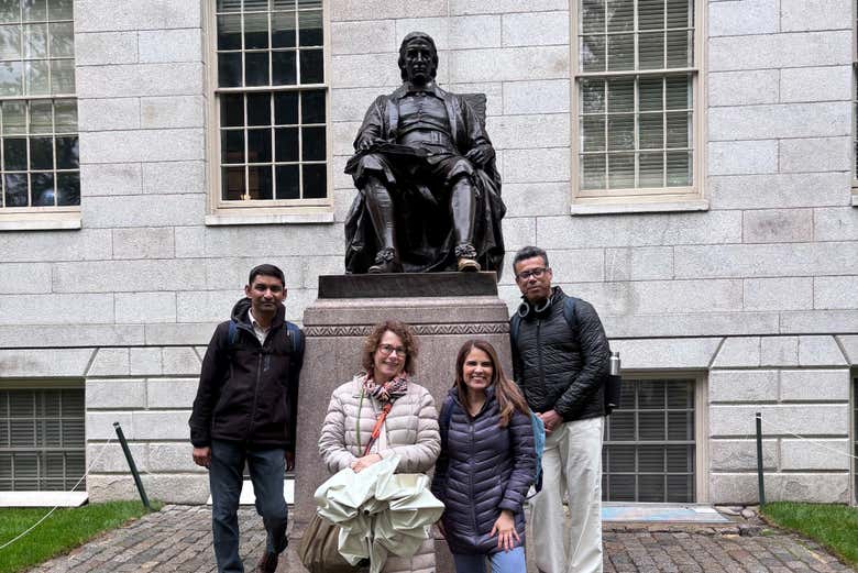 Take a picture with the statue of John Harvard