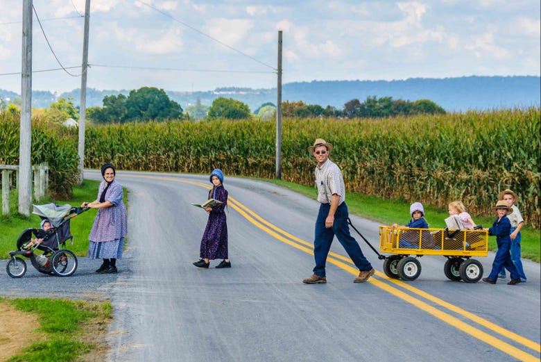 Amish family crossing the street