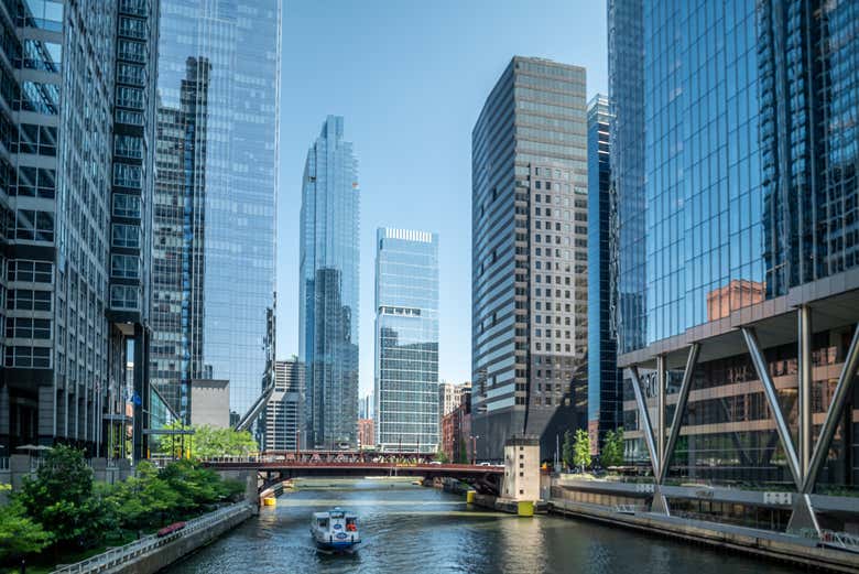 Walk the Riverwalk beneath the city's skyscrapers