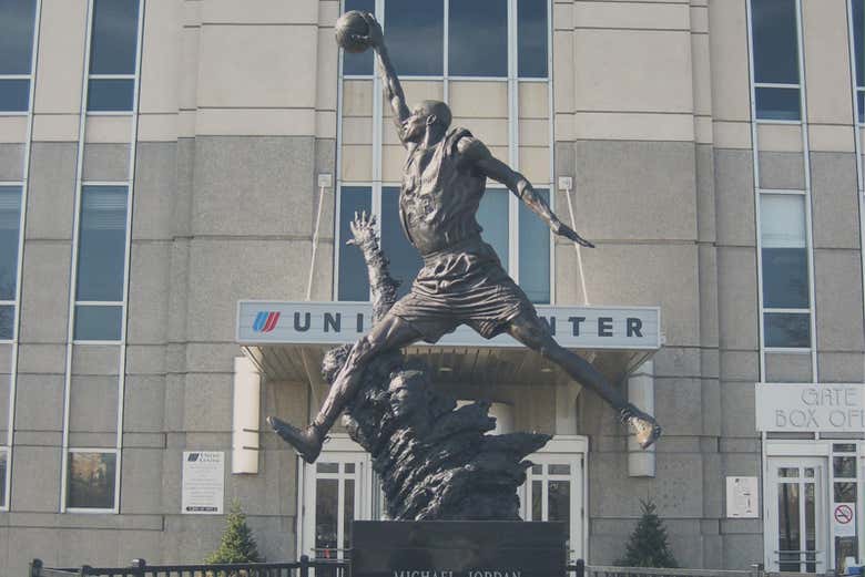 Take a picture with his iconic statue outside United Center