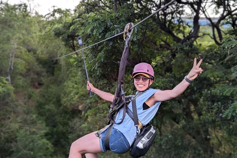 Soar across the scenic jungle canopy on a zipline