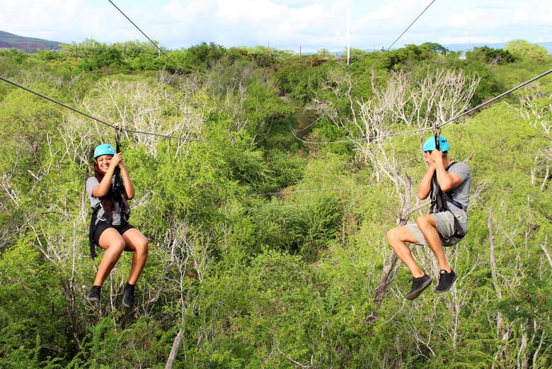 Sliding down the zip line