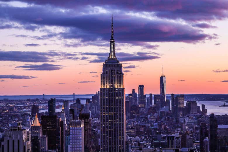 Look out over the New York skyline at sunset