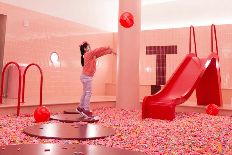 Playing in a pool of sprinkles