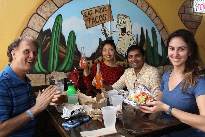 Enjoying the tasty tacos