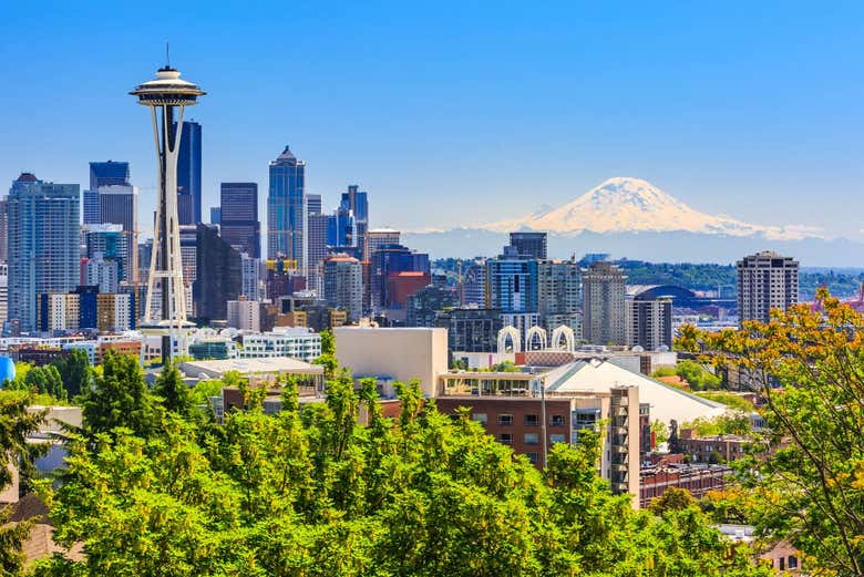 The Seattle skyline framed by the Space Needle and Mount Rainier