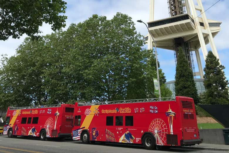 Seattle Sightseeing Bus next to the Space Needle